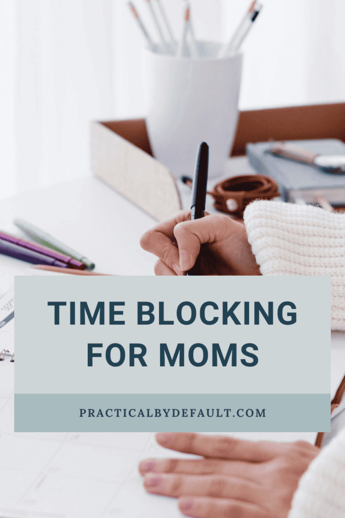 hand writing in a planner, time blocking for moms