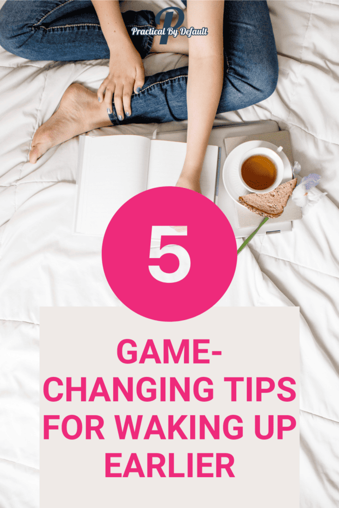 Graphic text says 5 Game-Changing Tips For Waking Up Earlier. Woman on bed with coffee and journal
