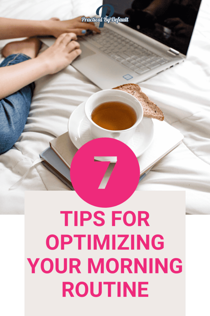 Graphic with a large pink number '7' and text 'TIPS FOR OPTIMIZING YOUR MORNING ROUTINE' with a background of a woman's hands on a laptop keyboard, a cup of tea, and a piece of toast on a white plate, all resting on a white bedspread. The logo 'Practical By Default' is visible