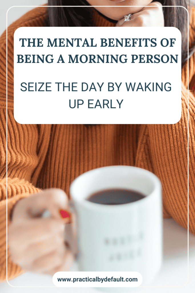An image featuring a woman holding a mug next to a notepad, with the text overlay 'THE MENTAL BENEFITS OF BEING A MORNING PERSON - SEIZE THE DAY BY WAKING UP EARLY' on a clear background, indicating content for working homeschool moms